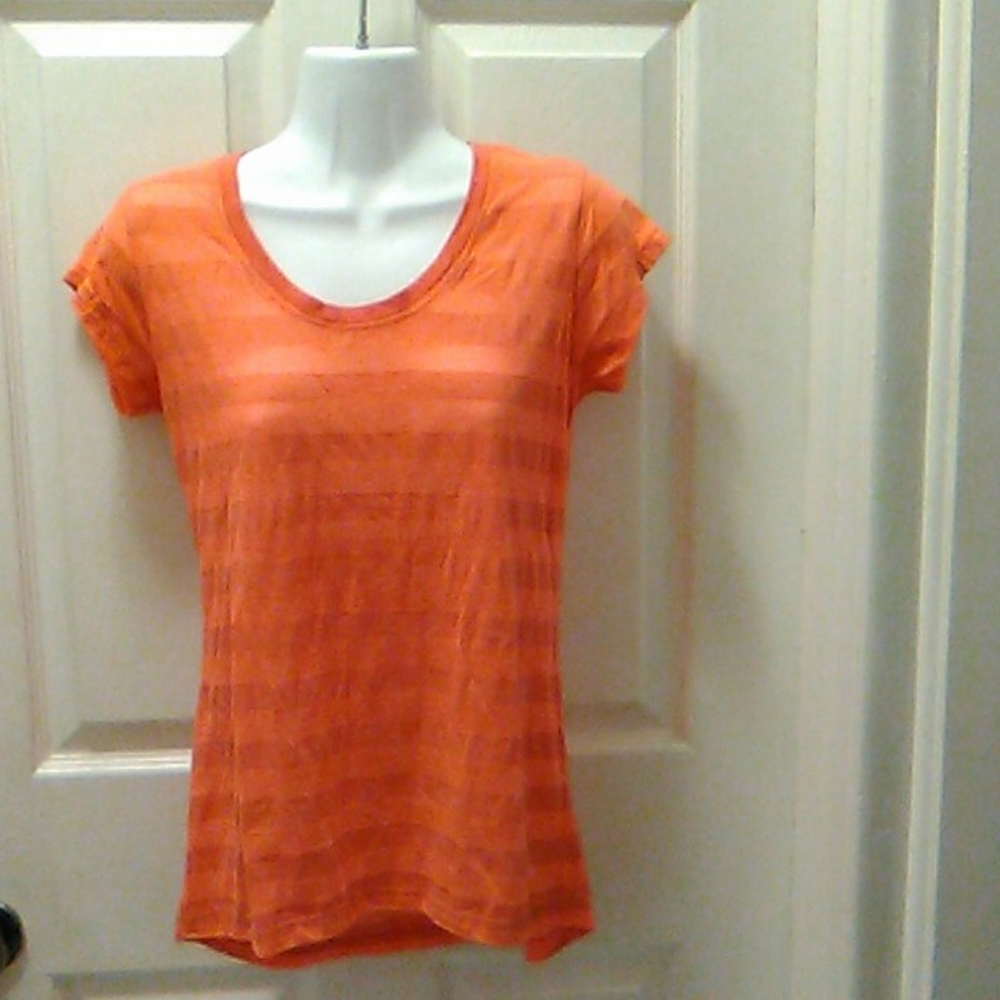 Orange knit top by "the Balance Collection"